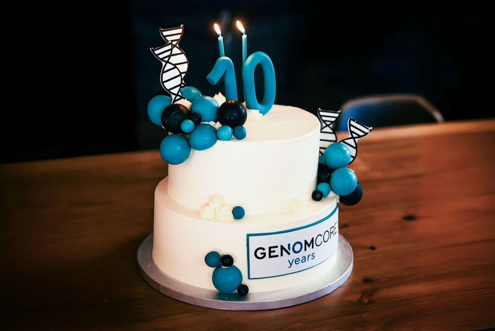 Genomcore team celebrating the company's 10th anniversary